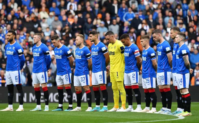 Dundee United fans sing ‘Lizzie’s in a box’ during minute’s silence at Ibrox Dundee United fans sing ‘Lizzie’s in a box’ during minute’s silence at Ibrox