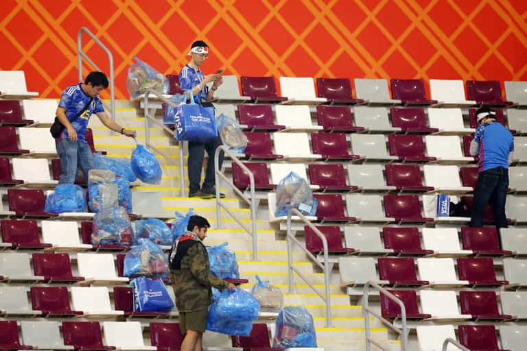 Japan supporters clean up rubbish following famous win over Germany Japan supporters clean up rubbish following famous win over Germany