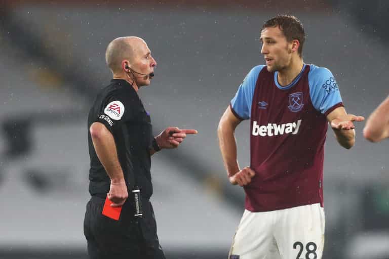Death threats sent to referee Mike Dean and his family after Soucek red card Death threats sent to referee Mike Dean and his family after Soucek red card