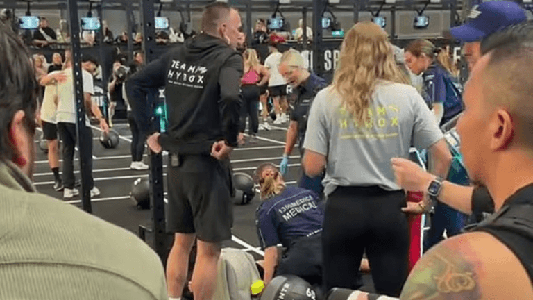 Hyrox athlete completes race while girlfriend is treated by paramedics sparking huge debate
