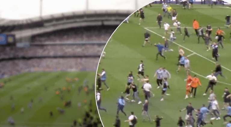 Video emerges of ‘assault’ on Robin Olsen during Man City pitch invasion Video emerges of ‘assault’ on Robin Olsen during Man City pitch invasion
