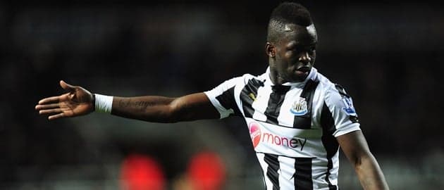 Cheick Tiote apologises after being pictured holding open champagne bottle while driving Cheick Tiote apologises after being pictured holding open champagne bottle while driving