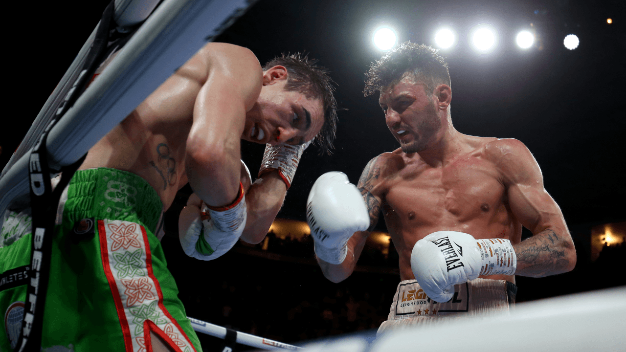 Michael Conlan falls out of the ring in final round KO defeat to Leigh Wood