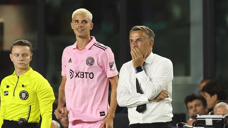 Phil Neville defends playing Romeo Beckham and his son in 6-0 loss to Barcelona Phil Neville defends playing Romeo Beckham and his son in 6-0 loss to Barcelona