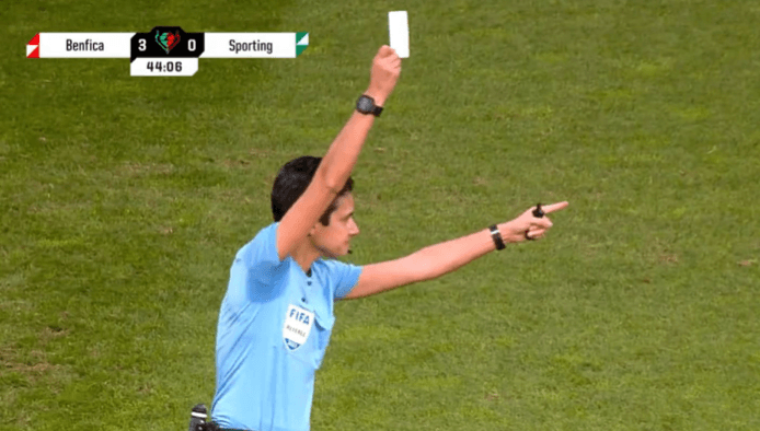 Referee shows white card during Sporting Lisbon vs Benfica Referee shows white card during Sporting Lisbon vs Benfica