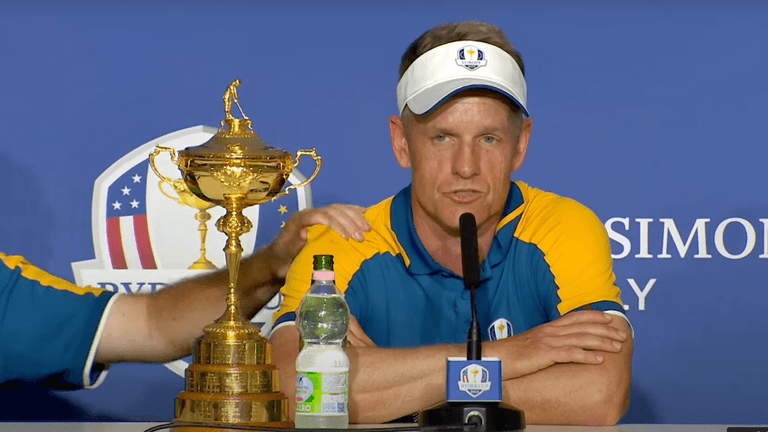 Shane Lowry comforts Luke Donald as he speaks about his late parents Shane Lowry comforts Luke Donald as he speaks about his late parents