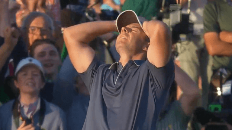 Rory McIlroy completes Grand Slam with Masters victory after play-off Rory McIlroy completes Grand Slam with Masters victory after play-off