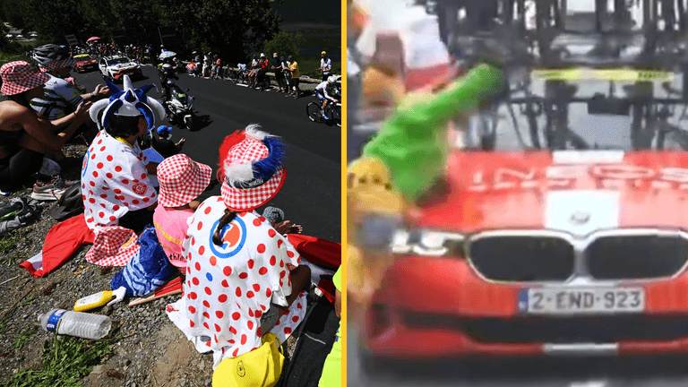 Risk-taking spectator knocked down by team car in Tour de France Risk-taking spectator knocked down by team car in Tour de France