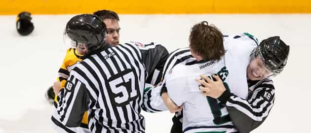 Throttled ice hockey player accidentally punches linesman in the face Throttled ice hockey player accidentally punches linesman in the face