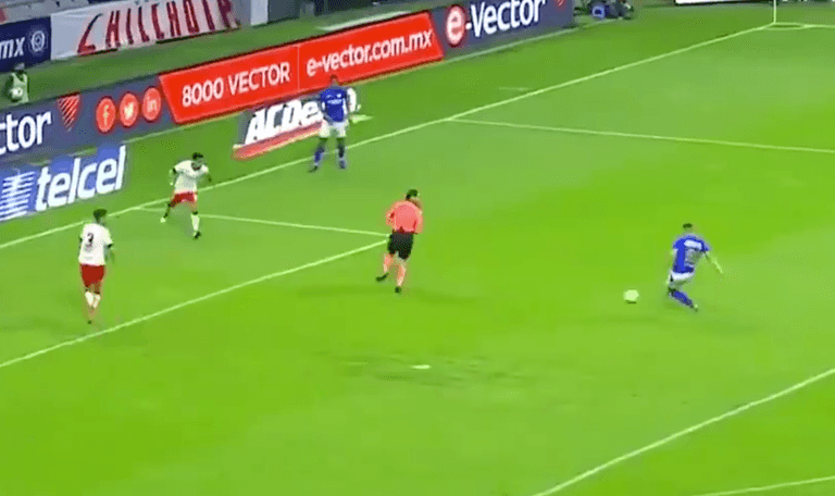 Mexican referee waves play on after accidentally blocking goal-bound shot Mexican referee waves play on after accidentally blocking goal-bound shot