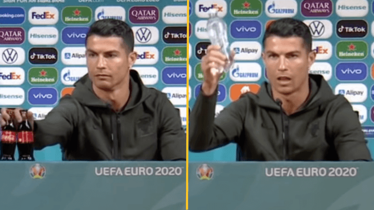 Ronaldo removes Coke, shows off the drink of champions in pre-match conference Ronaldo removes Coke, shows off the drink of champions in pre-match conference