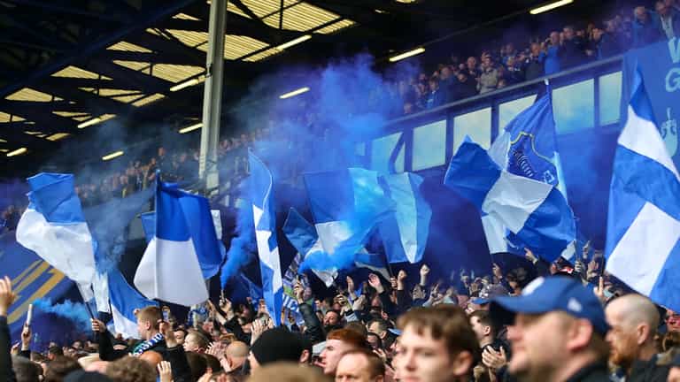 Everton fan hides ball under his jumper during crucial win over Chelsea Everton fan hides ball under his jumper during crucial win over Chelsea