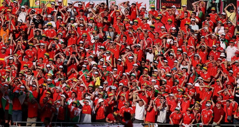 Wales supporter who travelled to World Cup with his son dies in Qatar Wales supporter who travelled to World Cup with his son dies in Qatar