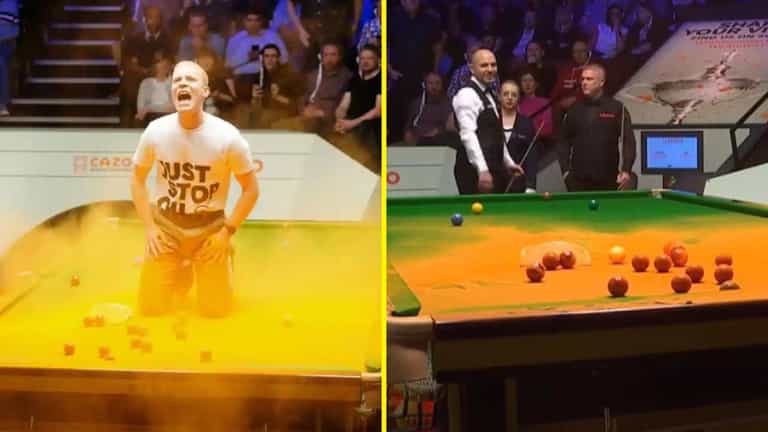 Just Stop Oil protester jumps on table during World Snooker Championship match Just Stop Oil protester jumps on table during World Snooker Championship match