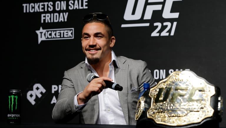 Freak injury forces Robert Whittaker to abandon title defence fight at UFC 234 Freak injury forces Robert Whittaker to abandon title defence fight at UFC 234
