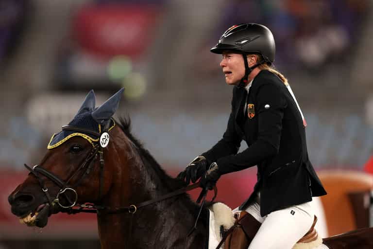 German pentathlon coach thrown out of Tokyo Games for ‘punching a horse’ German pentathlon coach thrown out of Tokyo Games for ‘punching a horse’