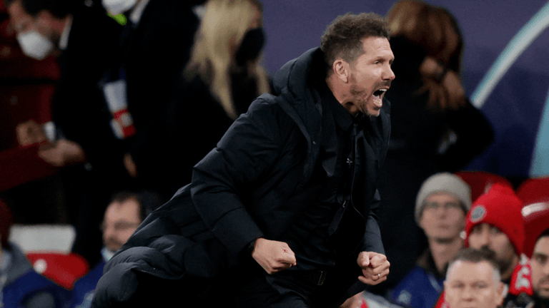 Diego Simeone struck by bottles from crowd after Champions League win Diego Simeone struck by bottles from crowd after Champions League win