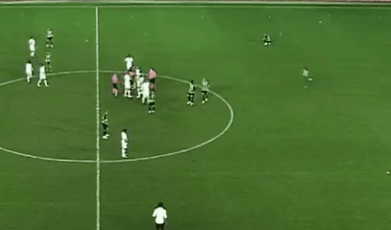 Furious Besiktas fan storms the pitch and drop kicks player Furious Besiktas fan storms the pitch and drop kicks player