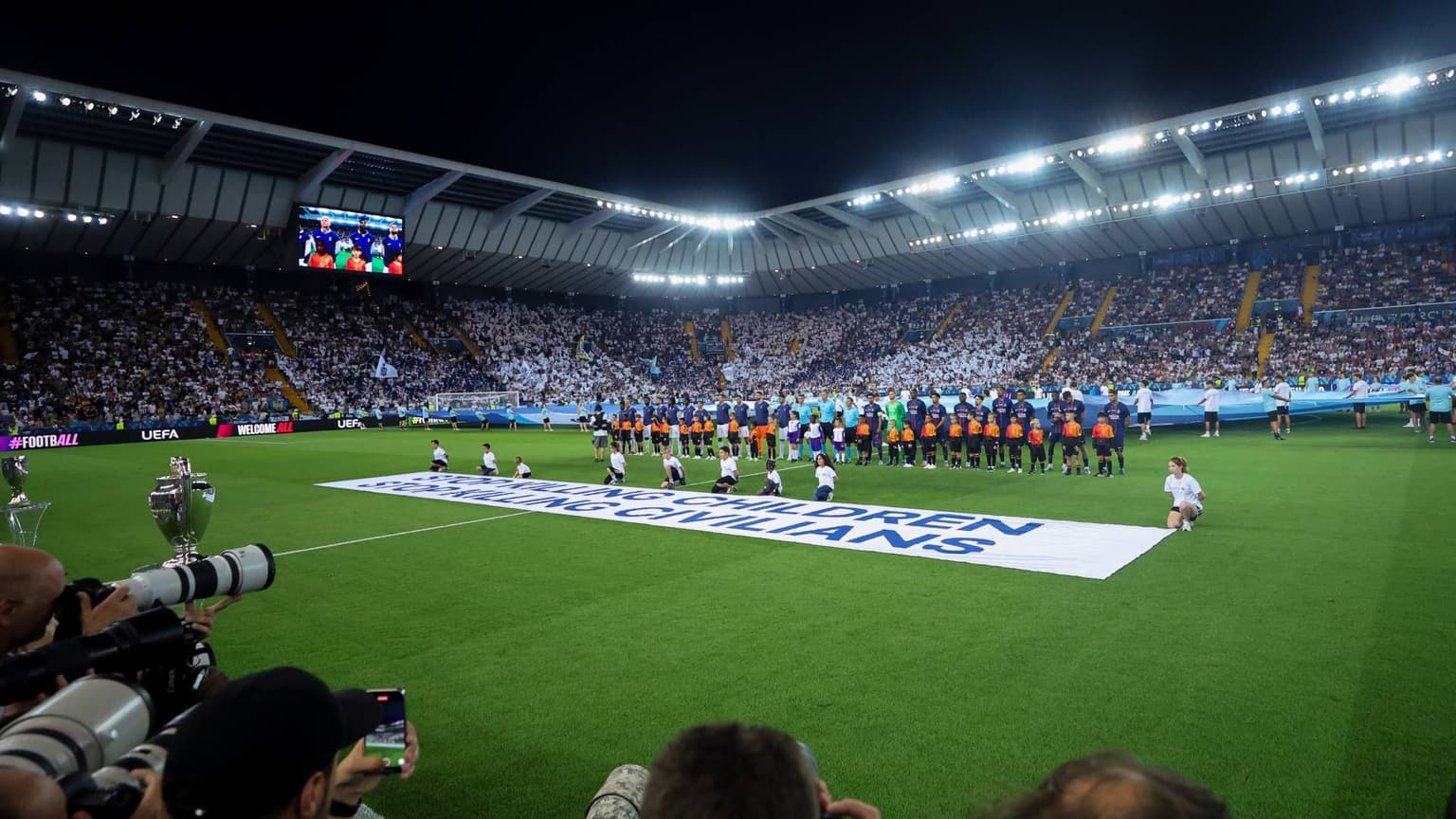 Uefa says ‘stop killing children’ banner was not political
