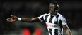 Cheick Tiote apologises after being pictured holding open champagne bottle while driving