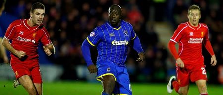 Pic: Adebayo Akinfenwa reveals that his two interests away from football are exactly what you’d expect