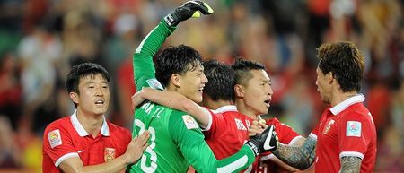 VIDEO: Ball-boy helps China’s goalkeeper save penalty by telling him which way to dive