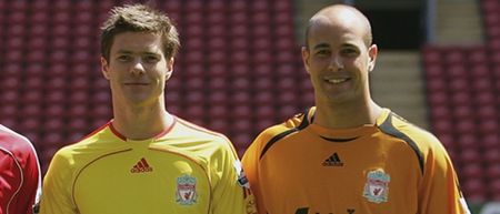 PIC: Pepe Reina and Xabi Alonso are happy out watching the Liverpool game from Germany