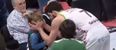 VIDEO: Sound out basketball player comforts young kid after full-court brawl breaks out