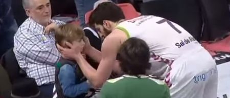 VIDEO: Sound out basketball player comforts young kid after full-court brawl breaks out