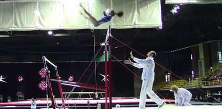 Video: Coach makes catch of the year (twice!) to save gymnast from breaking her neck