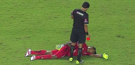 VIDEO: Goalkeeper pretends to be passed out to avoid red card for bringing down last man