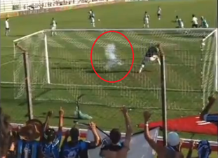 Video: Brazilian fans use rockets to distract opposition goalkeeper