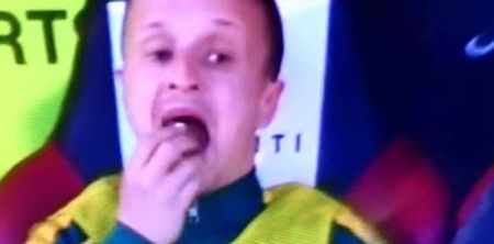 Vine: Leigh Griffiths gets caught slyly devouring a cake during Celtic match