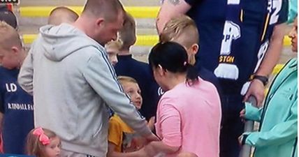 PICS: Woman appeared to grab Beckford’s jersey from a young fan