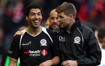 Pic: Steven Gerrard among the first to congratulate Luis Suarez on winning the Champions League