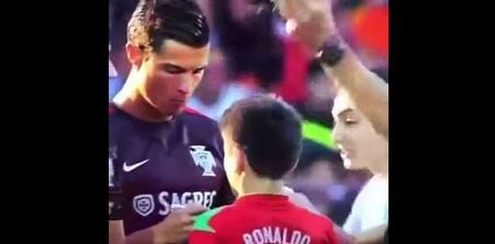 Vine: Cristiano Ronaldo signs autographs for two young pitch invaders in Armenia