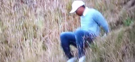 VINE: A sign of the times for poor Tiger Woods as he slips on his arse during the US Open