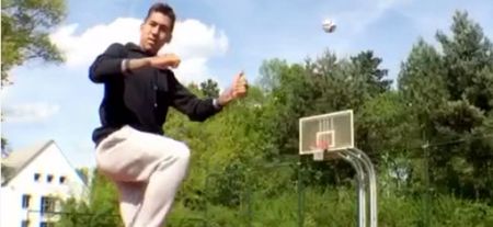 VINE: Liverpool and United target showing off with an outrageous no-look volley to basketball net