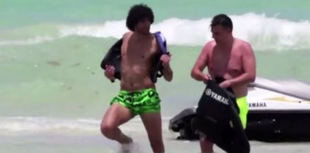 Video: Marouane Fellaini’s trademark afro proved to be problematic on his holidays