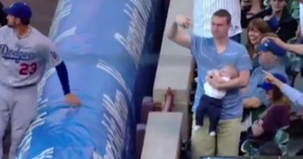 WATCH: Some men can feed a newborn and casually catch a baseball at the exact same time