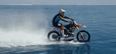 VIDEO: Nothing to see here, just a motorcyclist surfing a few waves… on his stunt bike