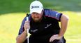 Shane Lowry finds himself alone in second after a battling Friday at Firestone