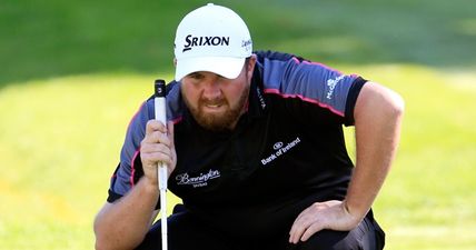 Shane Lowry finds himself alone in second after a battling Friday at Firestone