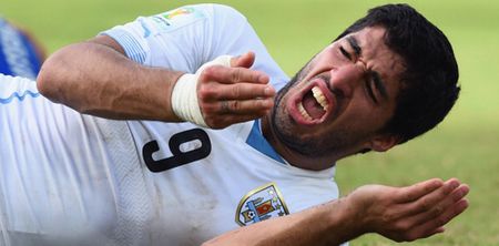 Vine: Luis Suarez (jokingly) tried to bite Lionel Messi at Champions League draw