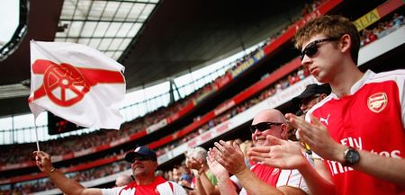 Arsenal fans send classy message to refugees with banner at Stoke game