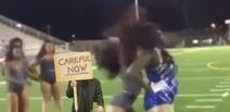 VIDEO: All hell breaks loose at High School American Football game… between the cheerleaders