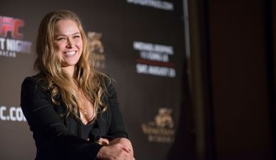 Pic: Ronda Rousey appears on the cover of a men’s fitness cover for the first time ever