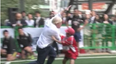 VIDEO: Boris Johnson mills tiny Japanese child during game of street rugby