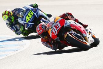 Video: MotoGP legend Valentino Rossi punished for kicking rival Marc Marquez off his bike at high speed