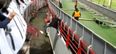 Video: Crowd assist allows Russian pitch invader escape match stewards